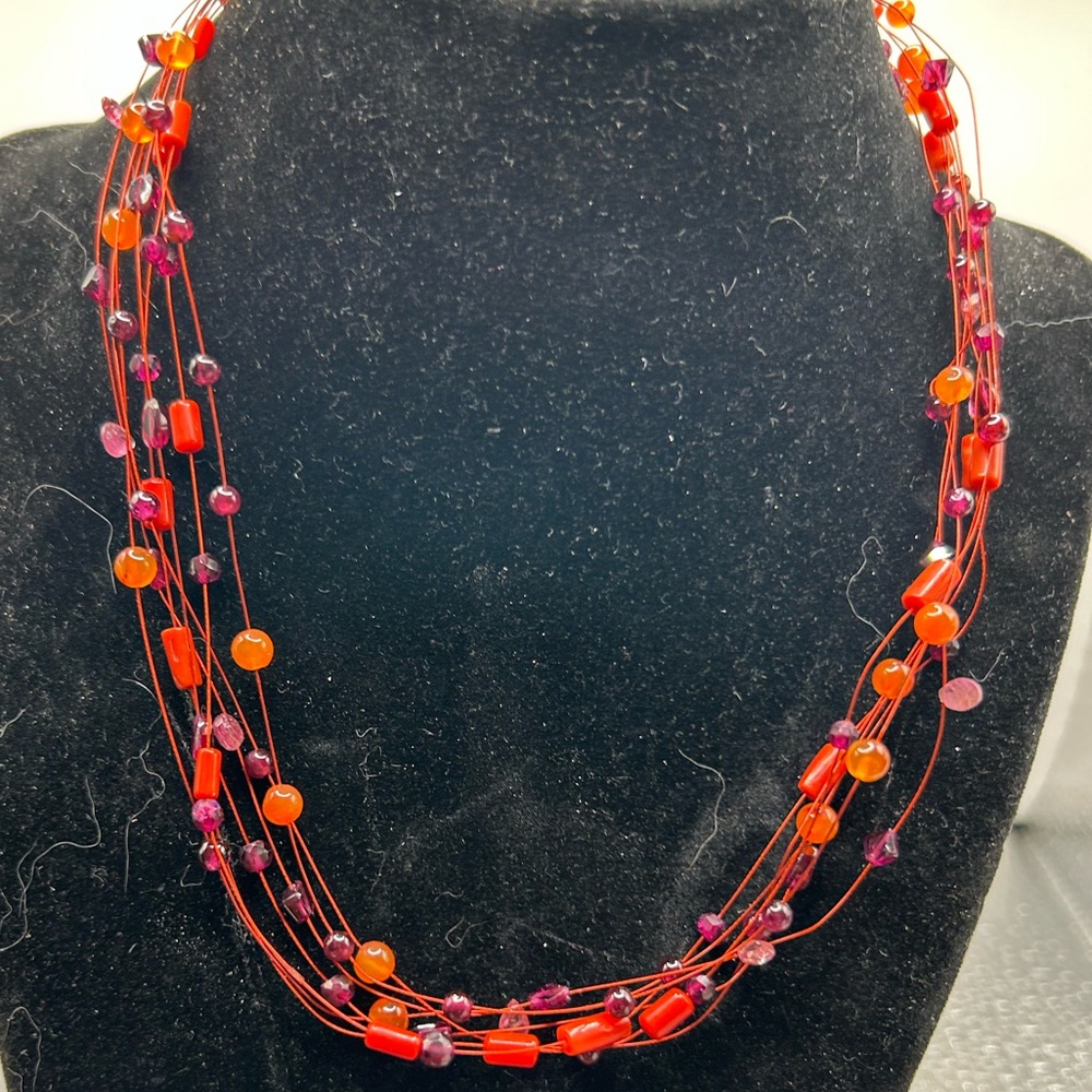 NWOT Beautiful Multi-Orange Colored Multi-Strand Necklace..